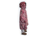 Woman wearing pink oversized hooded blanket with Indigenous aboriginal  nspired artwork and plush fleece lining