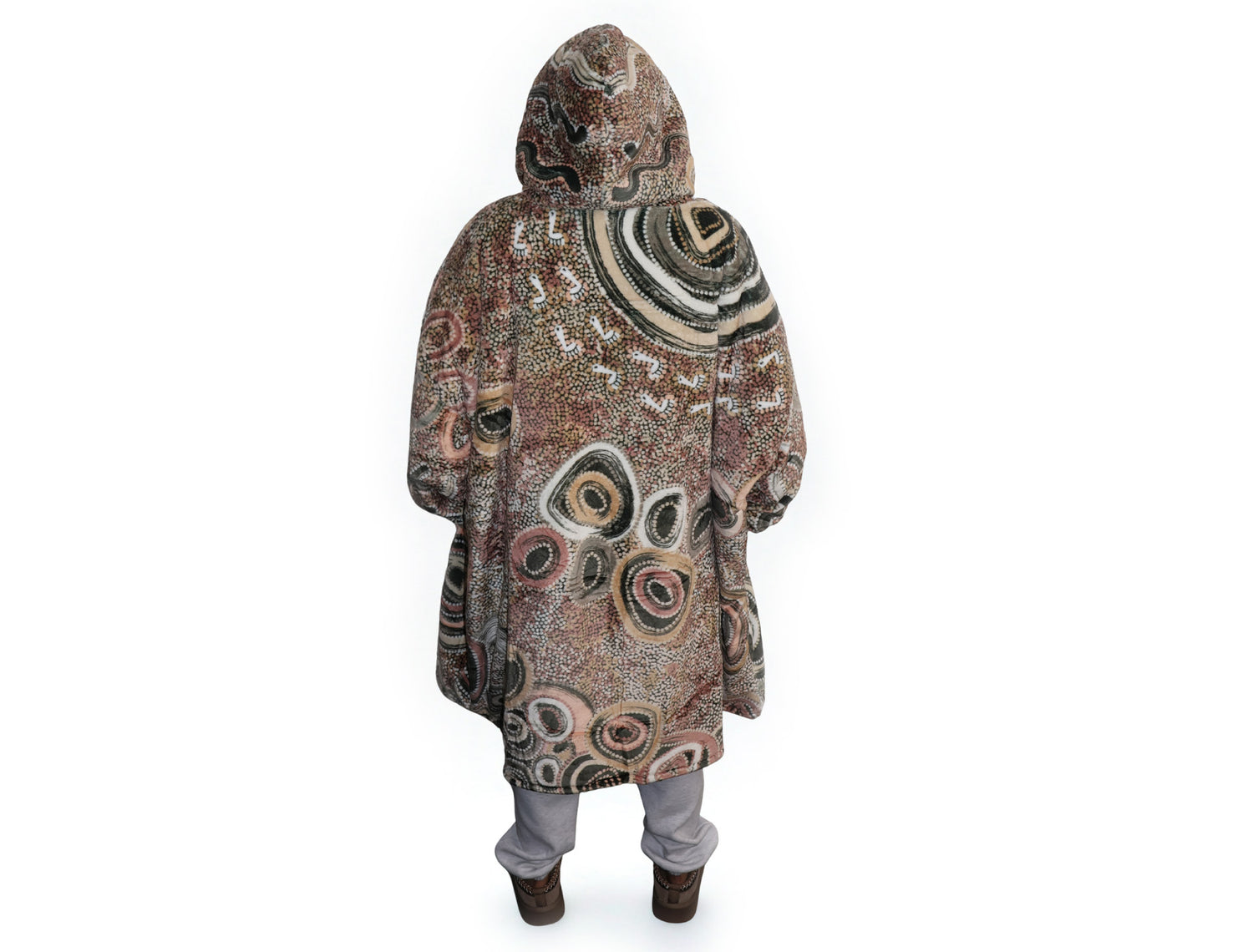 Neutral-toned oversized wearable blanket hoodie with Aboriginal-inspired pattern and front kangaroo pocket