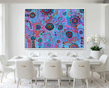 Large original Aboriginal painting by T'keyah Ware displayed in a contemporary white luxury dining room with elegant interior styling.