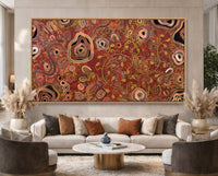 Out on Country by Kelly Taylor displayed as a large Aboriginal canvas print in a luxury designer living space