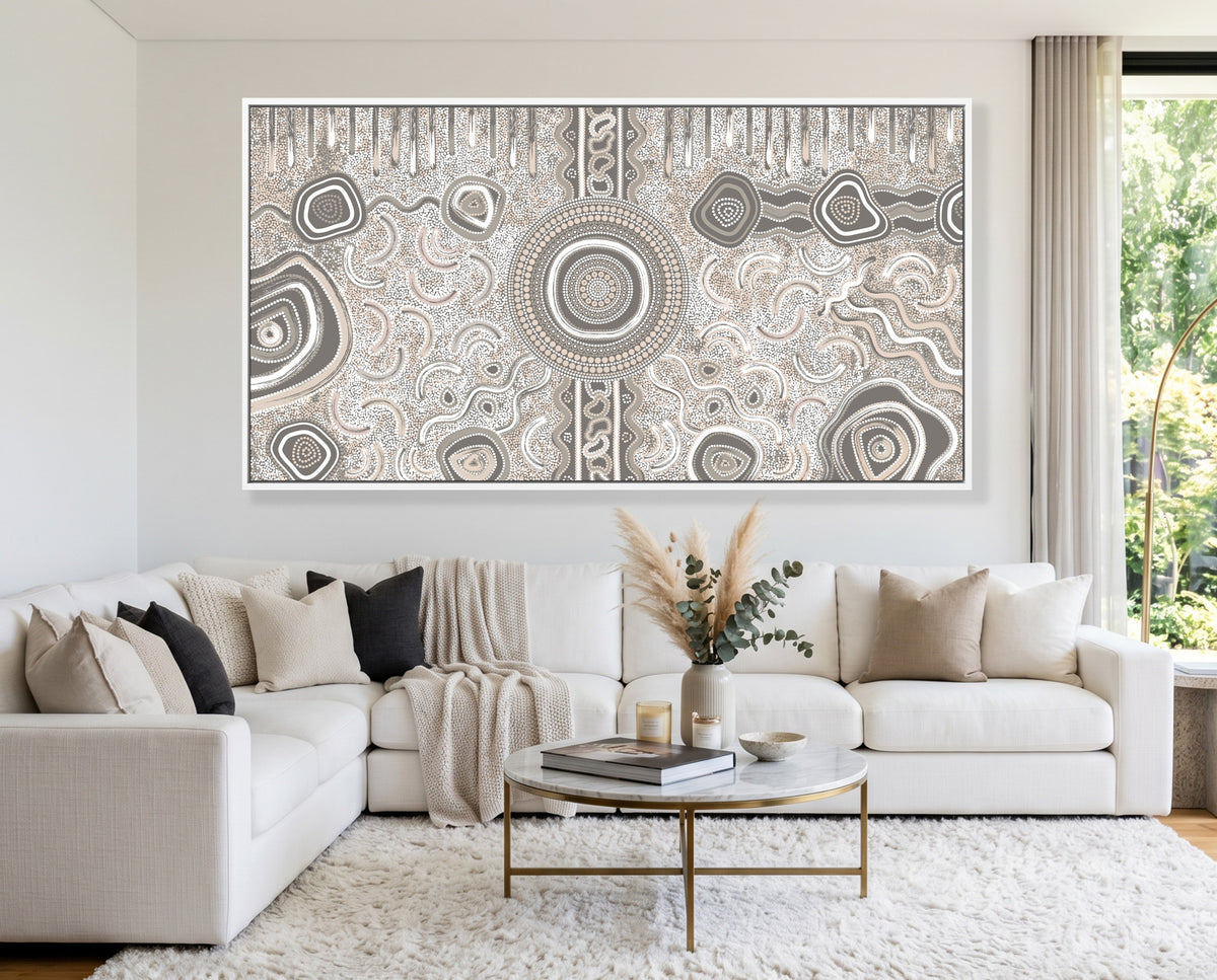Large Camping Under the Moonlight Aboriginal canvas print displayed above a modern white sofa.