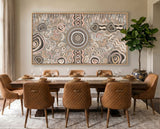 Camping Under the Moonlight Aboriginal canvas artwork above a dining table.