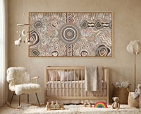 Modern living room with a aboriginal art painting camping under the moonlight above cot with wooden sofa, coffee table, and abstract wall art.