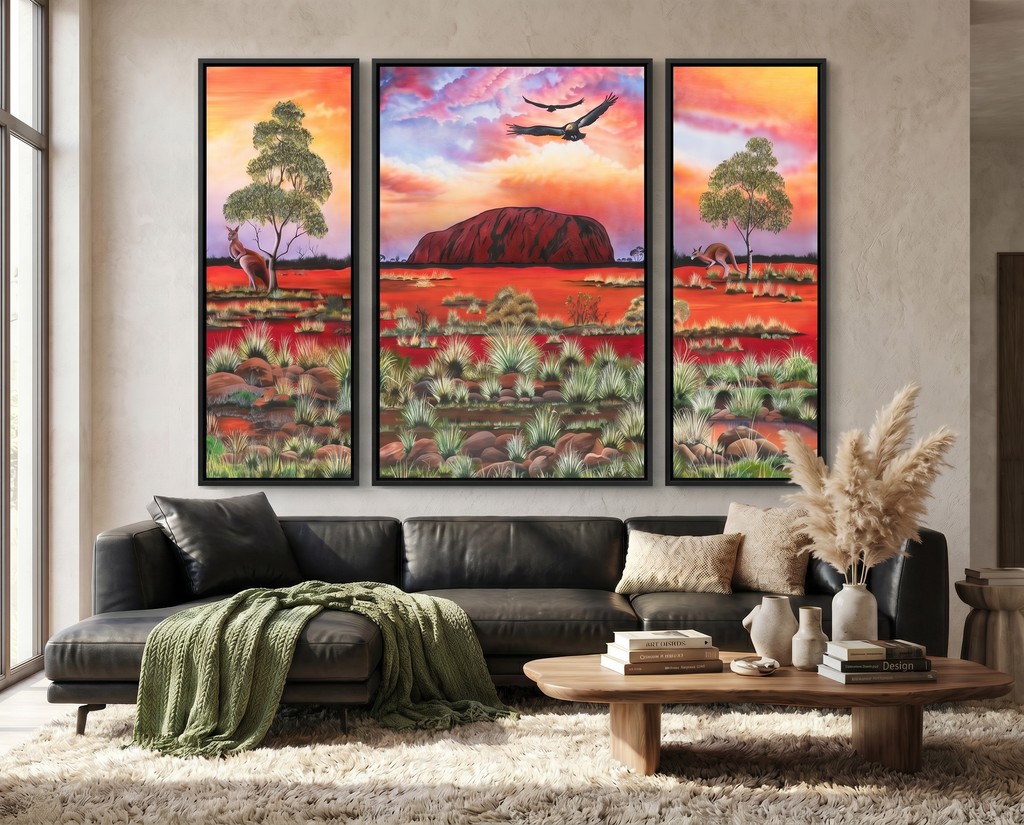 Heart of Our Country (Uluru) limited edition Aboriginal triptych canvas wall art styled above a modern living room sofa