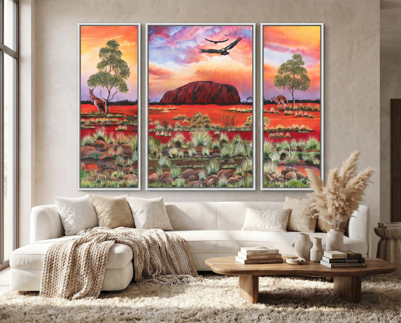 Large Aboriginal triptych canvas artwork inspired by Uluru displayed in contemporary Australian interior