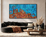 Desert Meets the Sea original Aboriginal painting above a modern black sofa by South Australian Aboriginal artist Kelly Taylor.