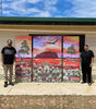 Kelly Taylor and KT Aboriginal Fine Art with Heart of Our Country (Uluru) original triptych artwork