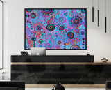 Modern reception area with a colorful aboriginal art painting by T'keyah Ware painting on a wall.