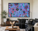 Contemporary Aboriginal painting My Mother's Country by T'keyah Ware featured above a fireplace in a sophisticated black luxury living room.