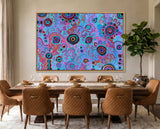 Original Aboriginal acrylic painting by T'keyah Ware displayed above a timber dining setting in a modern Australian home.