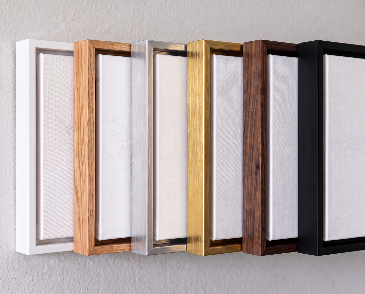 KTAFA float frames â€” white, oak, silver, gold, walnut and black